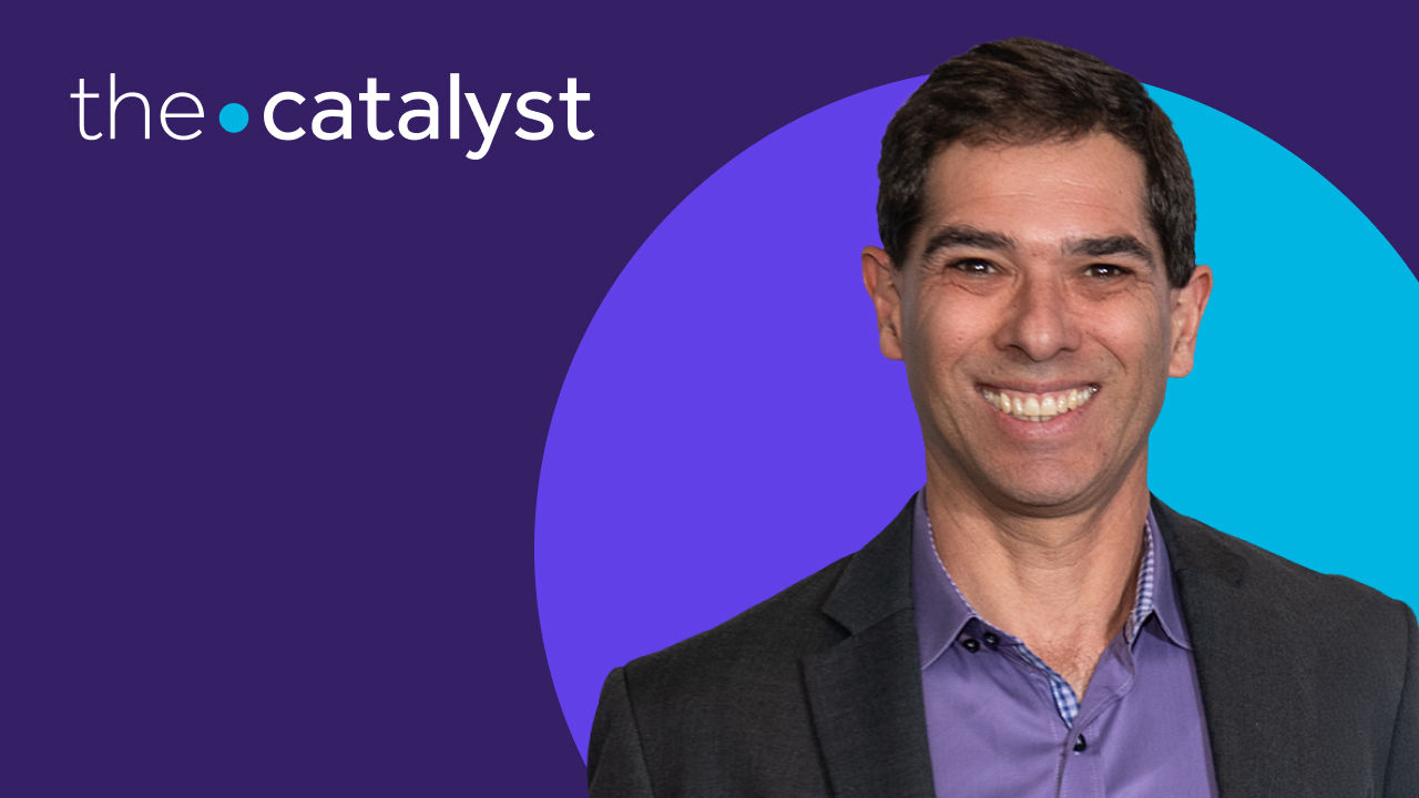 Erick Berke portrait with a plum and aqua background and the words "the catalyst"